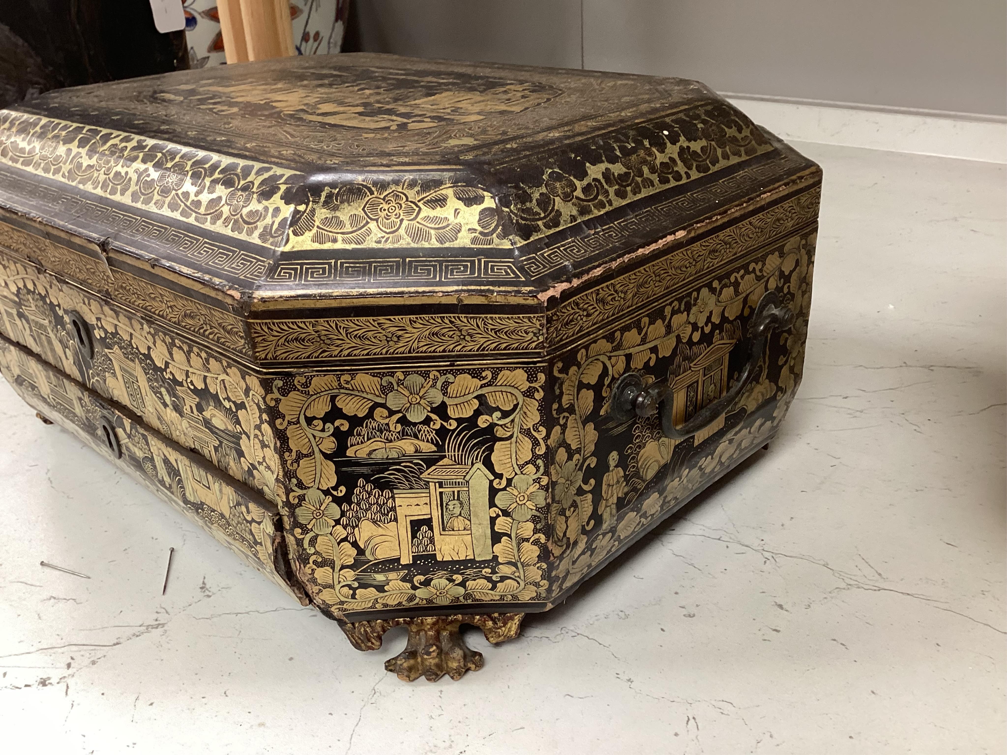 A Chinese export octagonal lacquered work box with fitted interior, 35cm wide
